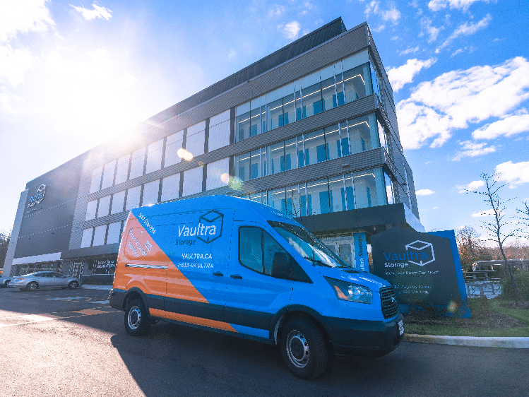 Vaultra Storage's Door-to-Door Service in Action - A representative cataloging and picking up various items, showcasing the convenience of our concierge storage model amid the booming self-storage trend in Canada.